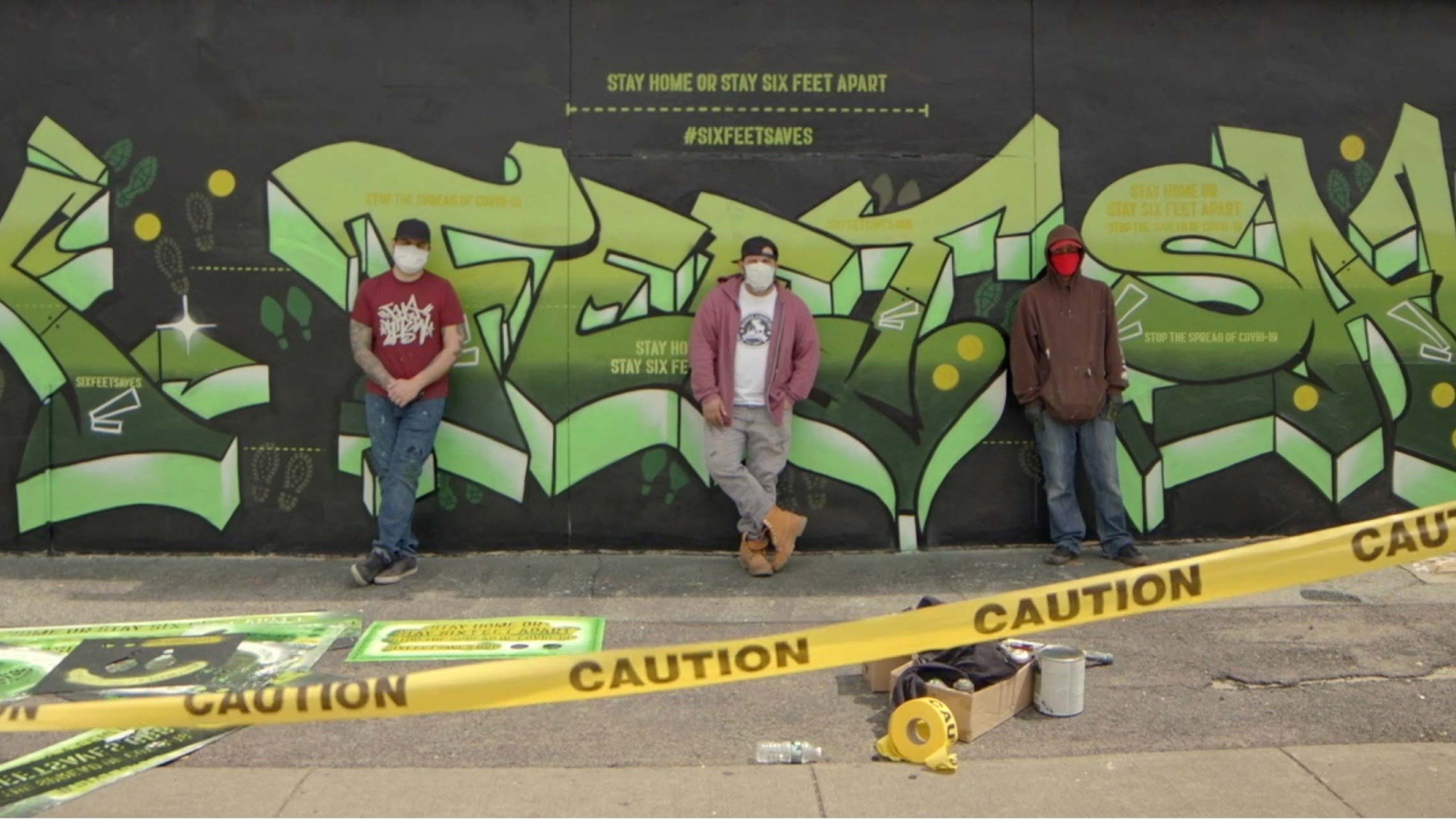 Click to view the video for the Six Feet Saves mural.